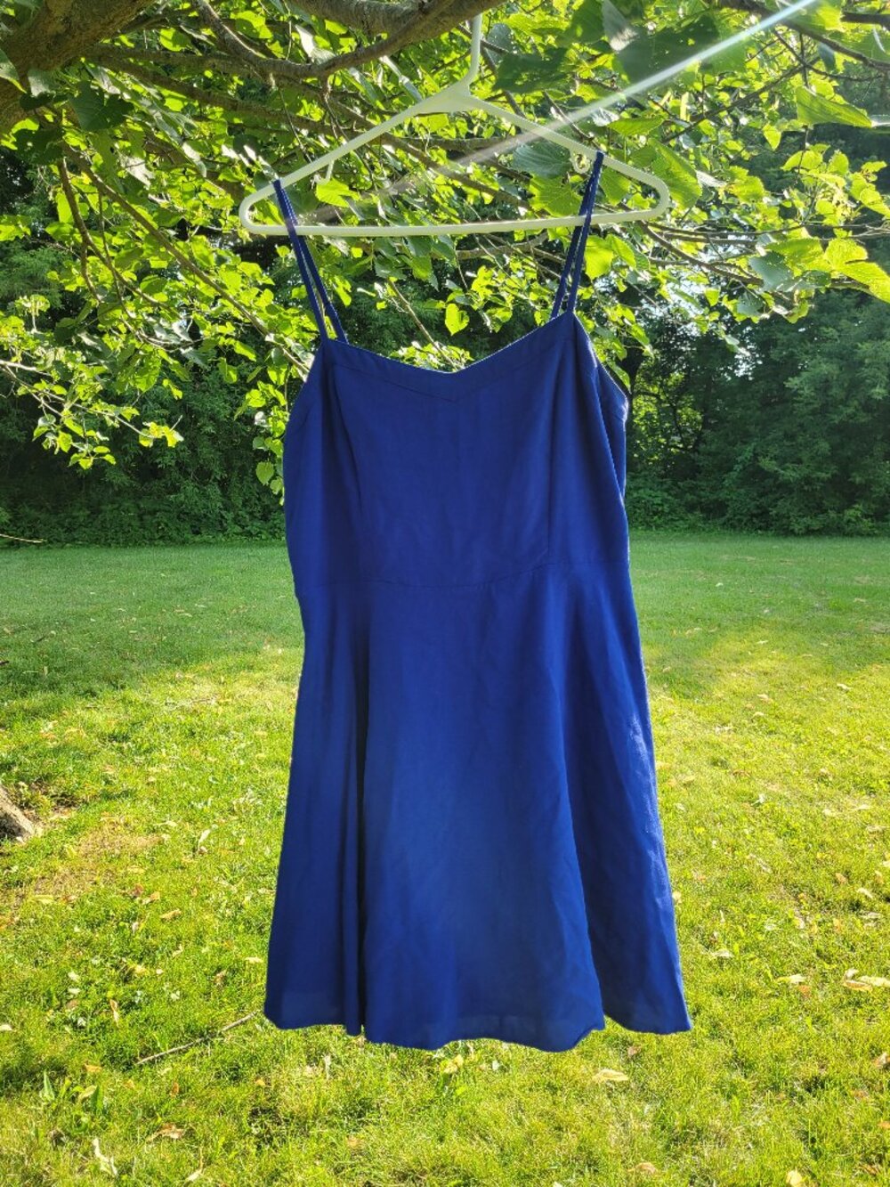 Gorgeous little cobalt/royal blue sundress with cut out detailing. Fit and flare